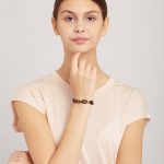 Bratara neagra cu linkuri din bronz